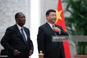 China's President Xi Jinping (R) and President of Ivory Coast Alassane Ouattara (L) during a welcome ceremony at the Great Hall of the People in Beijing, China, 30 August 2018. Ouattara is in China for Forum on China-Africa Cooperation which will be held from 03 to 04 September in Beijing. (Photo by Roman Pilipey - Pool/Getty Images)